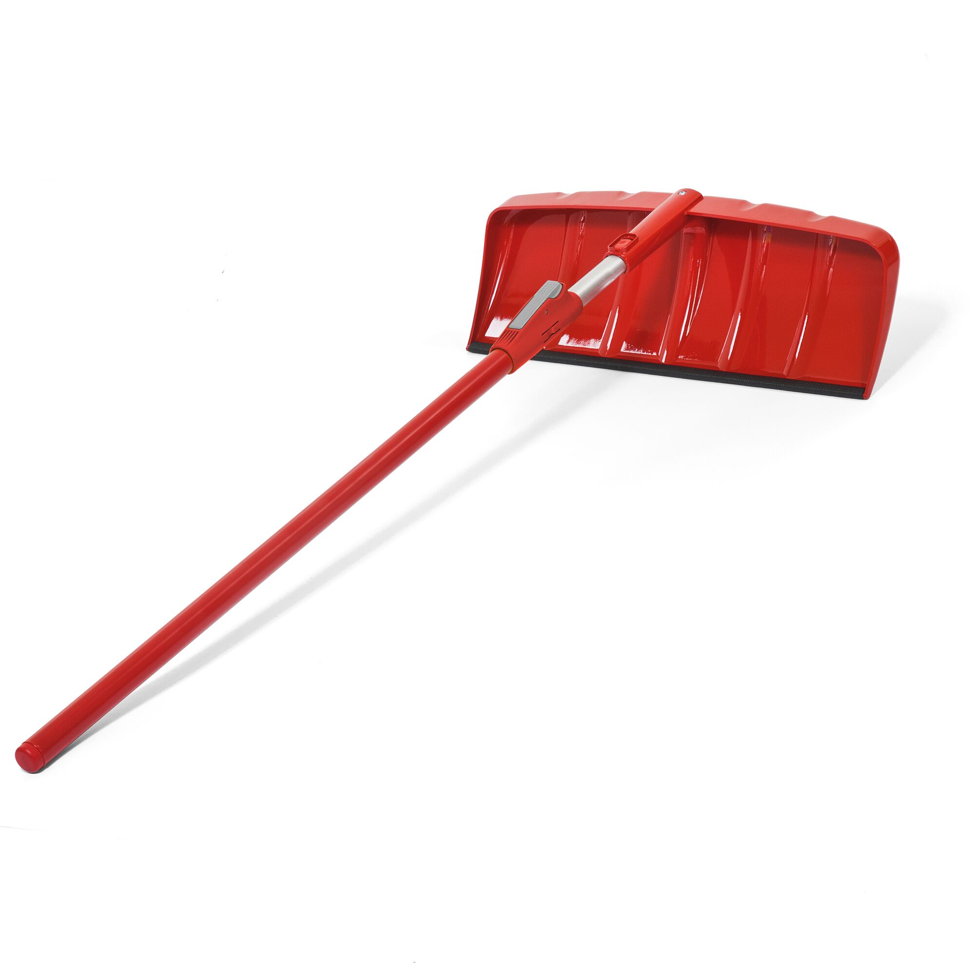 A red snow shovel with a wide plastic blade and a long handle, photographed against a white background.