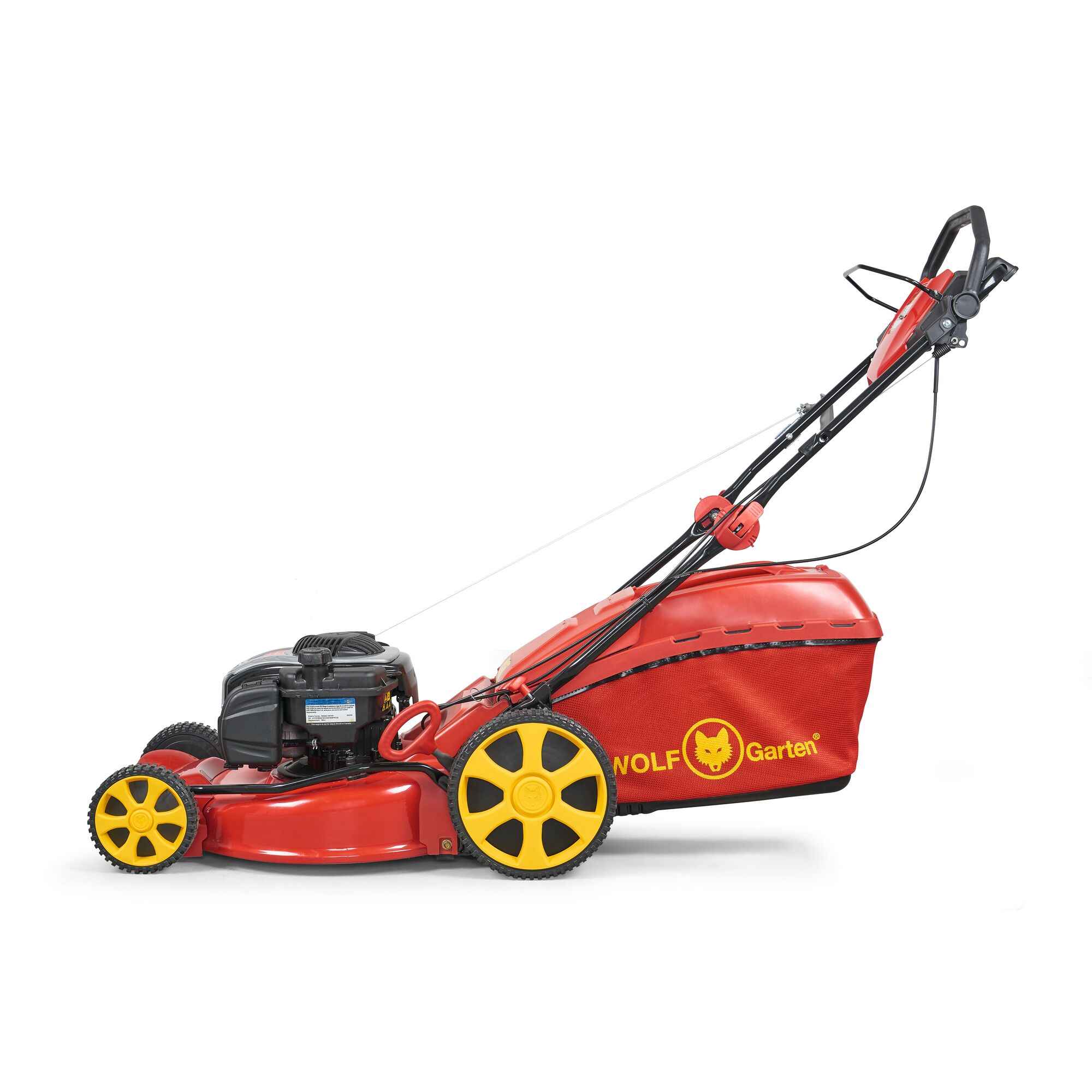 A red and yellow WOLF-Garten lawn mower with a grass collection bag attached, shown from the side against a white background.