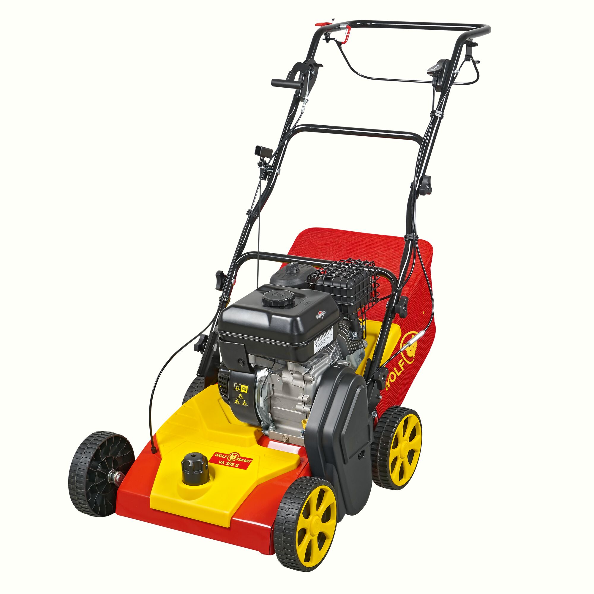 A WOLF-Garten lawn scarifier with a red and yellow body, black engine, and four yellow wheels. The machine has a handle for pushing and a red grass catcher at the back.