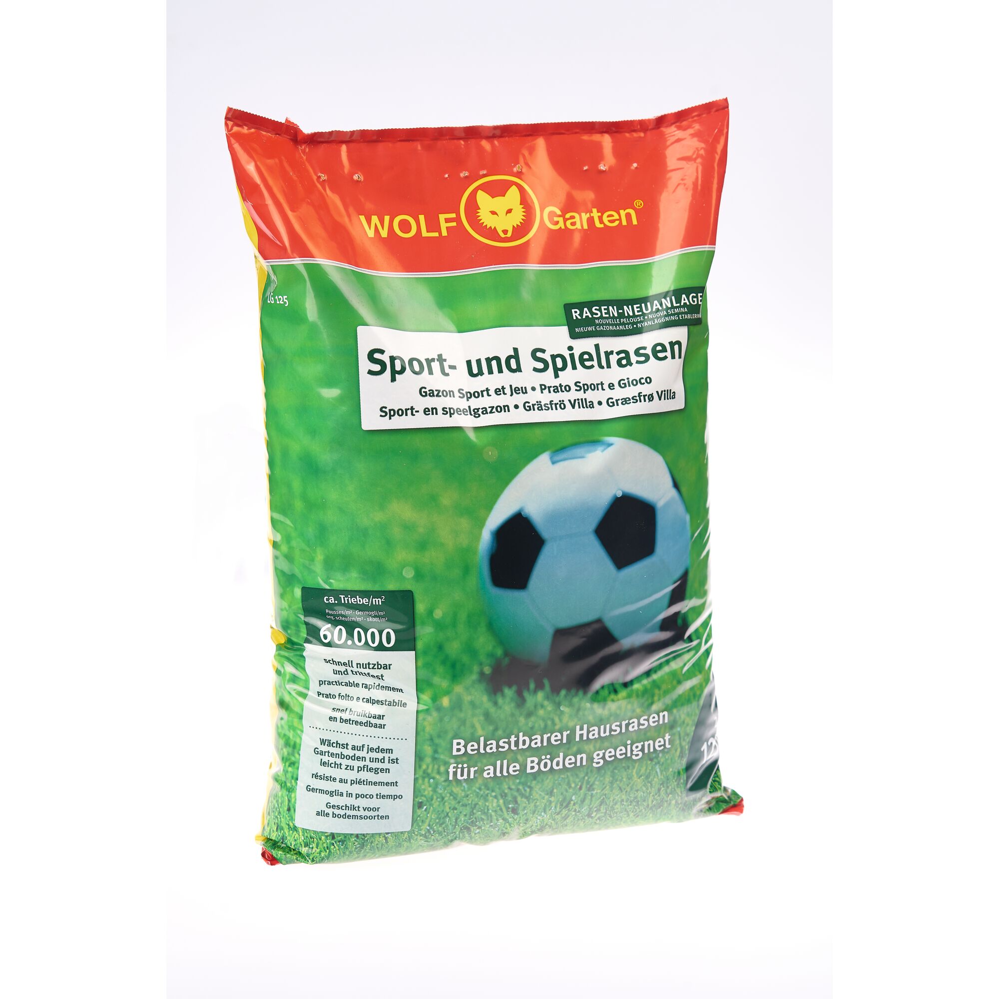 A bag of WOLF Garten Sport- und Spielrasen lawn seed, featuring a green and red packaging with a soccer ball graphic. The product is suitable for creating resilient lawns for sports and play areas and is designed for use on all types of soil.