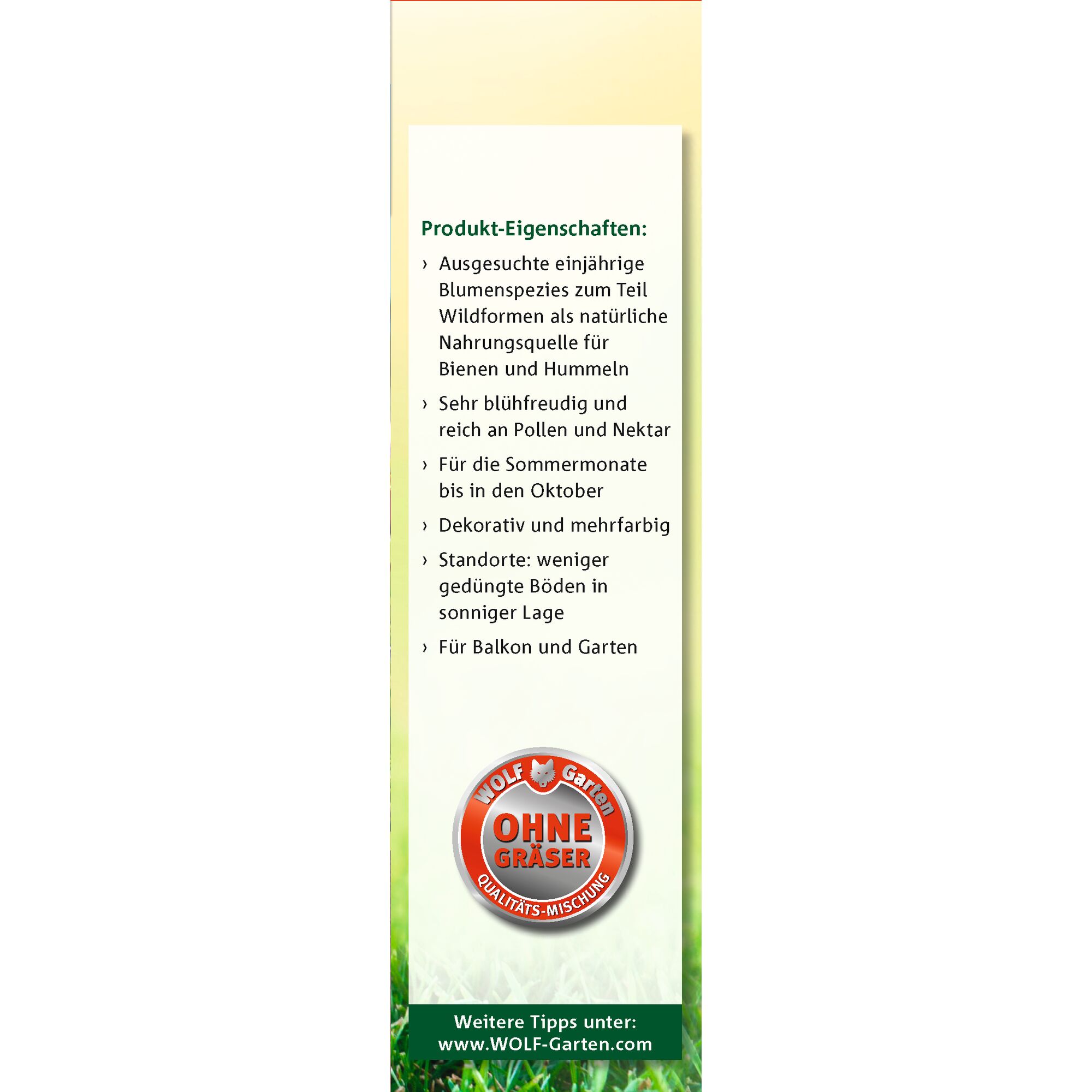 A product information label from WOLF-Garten for a flower seed mix. The label lists features such as selected annual flower species, partly wild forms as a source of food for bees and bumblebees, very floriferous and rich in pollen and nectar, suitable for summer months up to October, decorative and multicolored, locations: less fertilized soils in sunny positions, suitable for balcony and garden. There is a red badge stating 'OHNE GRÄSER' (without grasses) and web information for further tips.
