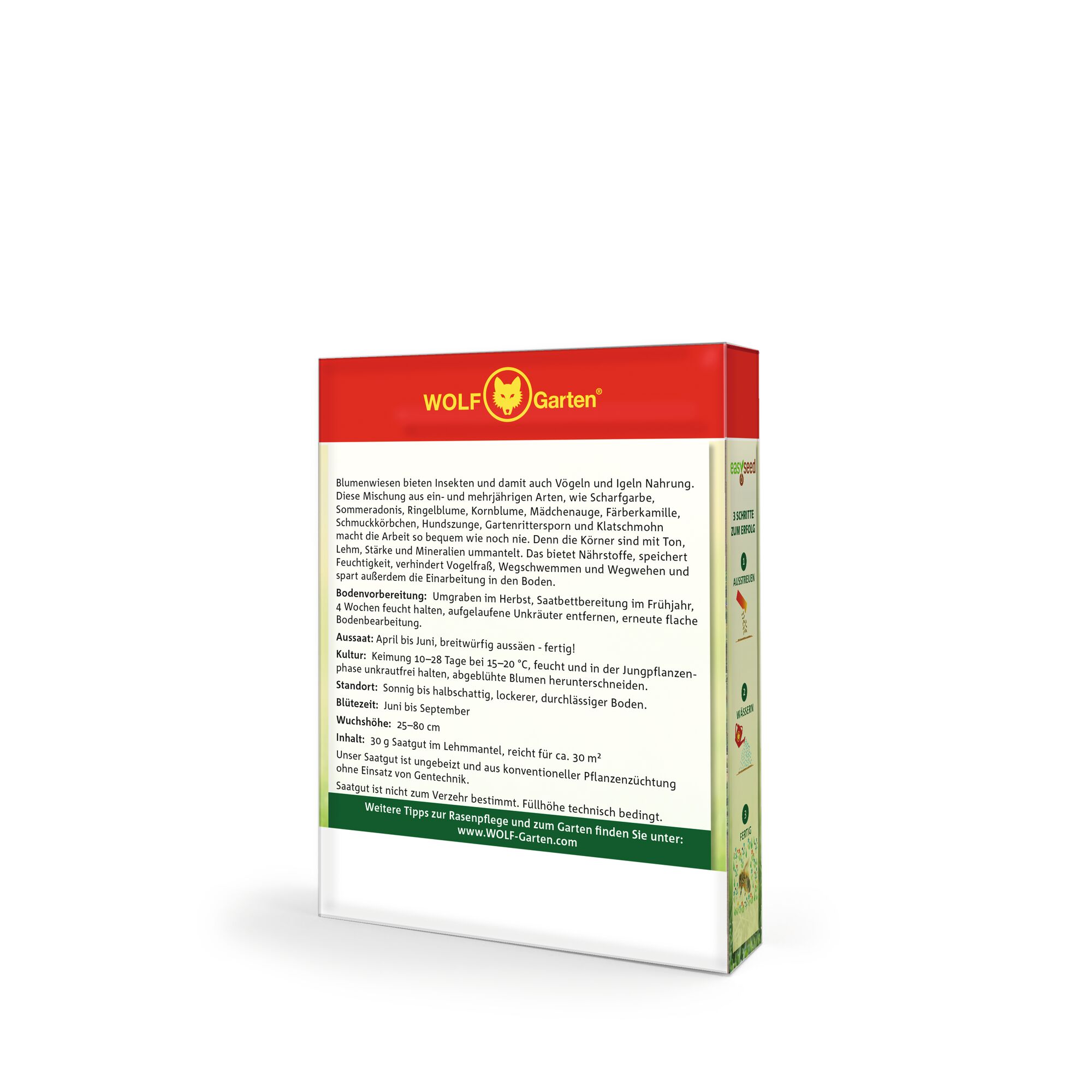 A box of WOLF-Garten wildflower seed mix. The packaging features the WOLF-Garten logo on a red background at the top, with detailed planting and care instructions in German below. The main instructions explain the benefits to insects, birds, and hedgehogs, and describe soil preparation, sowing, and care. The box is mostly white with green and red accents.