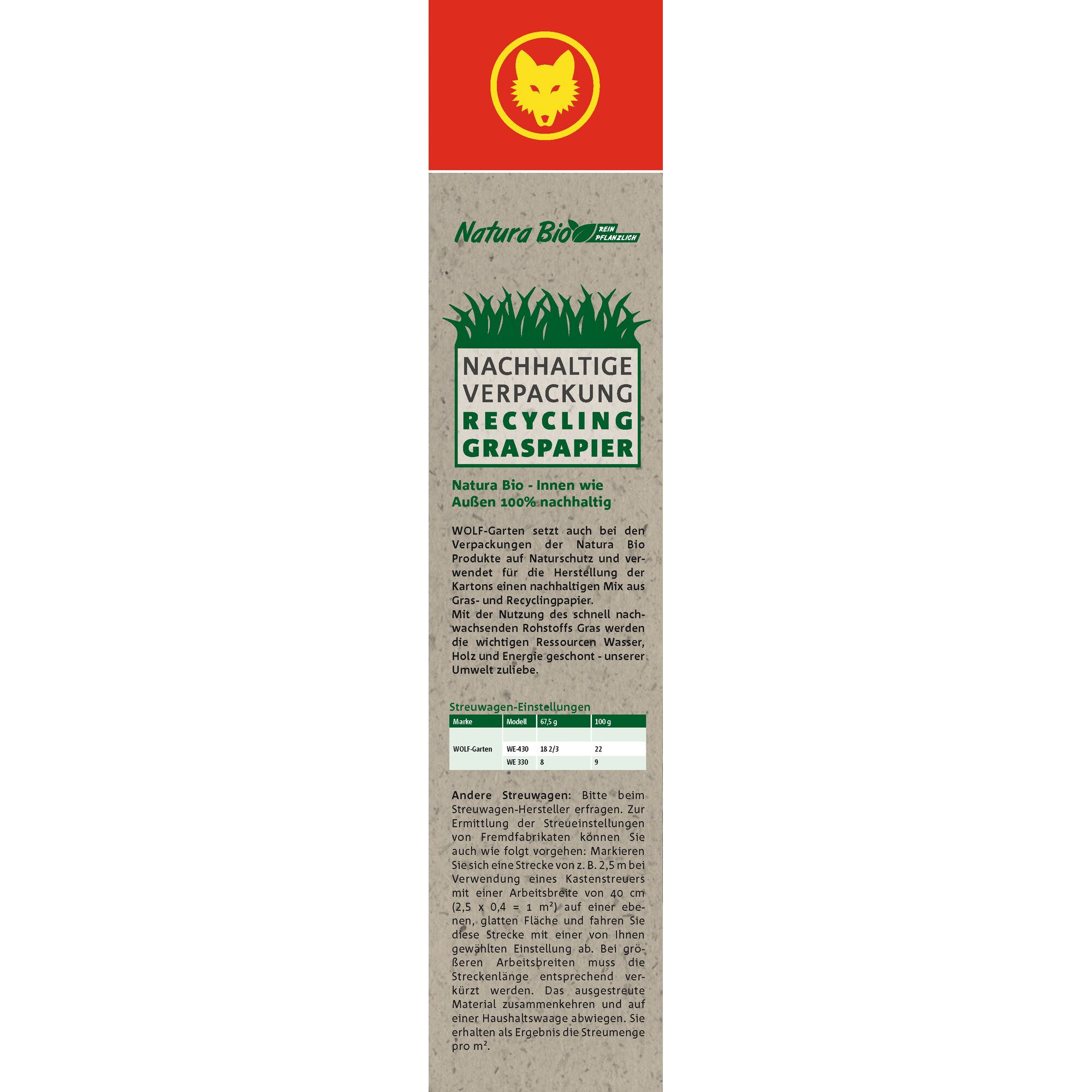 A WOLF-Garten Natura Bio product label featuring sustainable packaging made from recycled grass paper. The label describes the use of natural protective materials, sustainable mix of grass and recycled paper for carton production, and conservation of resources such as water, wood, and energy. Also includes spreading settings information and the WOLF-Garten logo at the top.