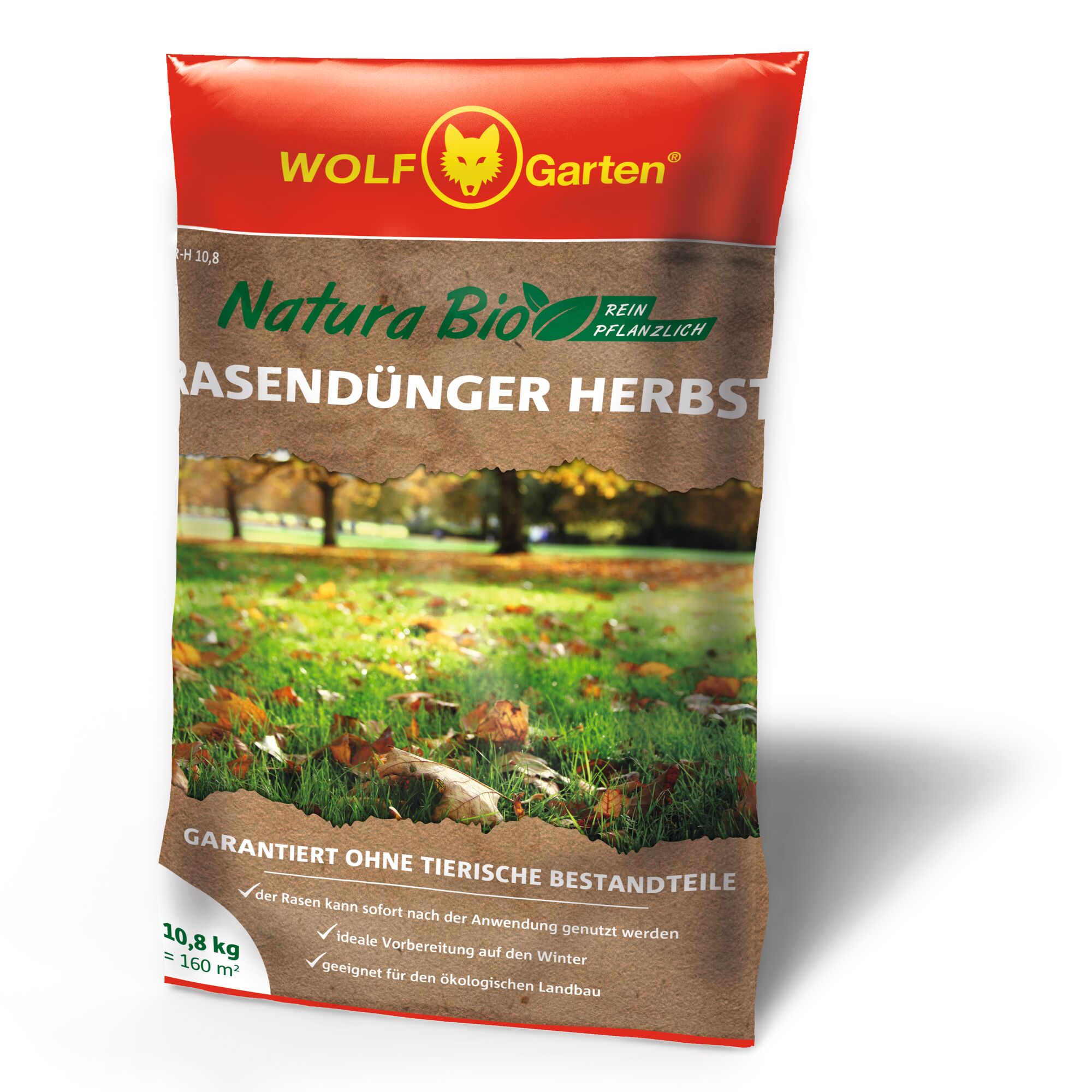 A bag of WOLF-Garten Natura Bio autumn lawn fertilizer, featuring plant-based ingredients, suitable for ecological farming. The packaging shows a red and brown color scheme with a green lawn and autumn leaves.