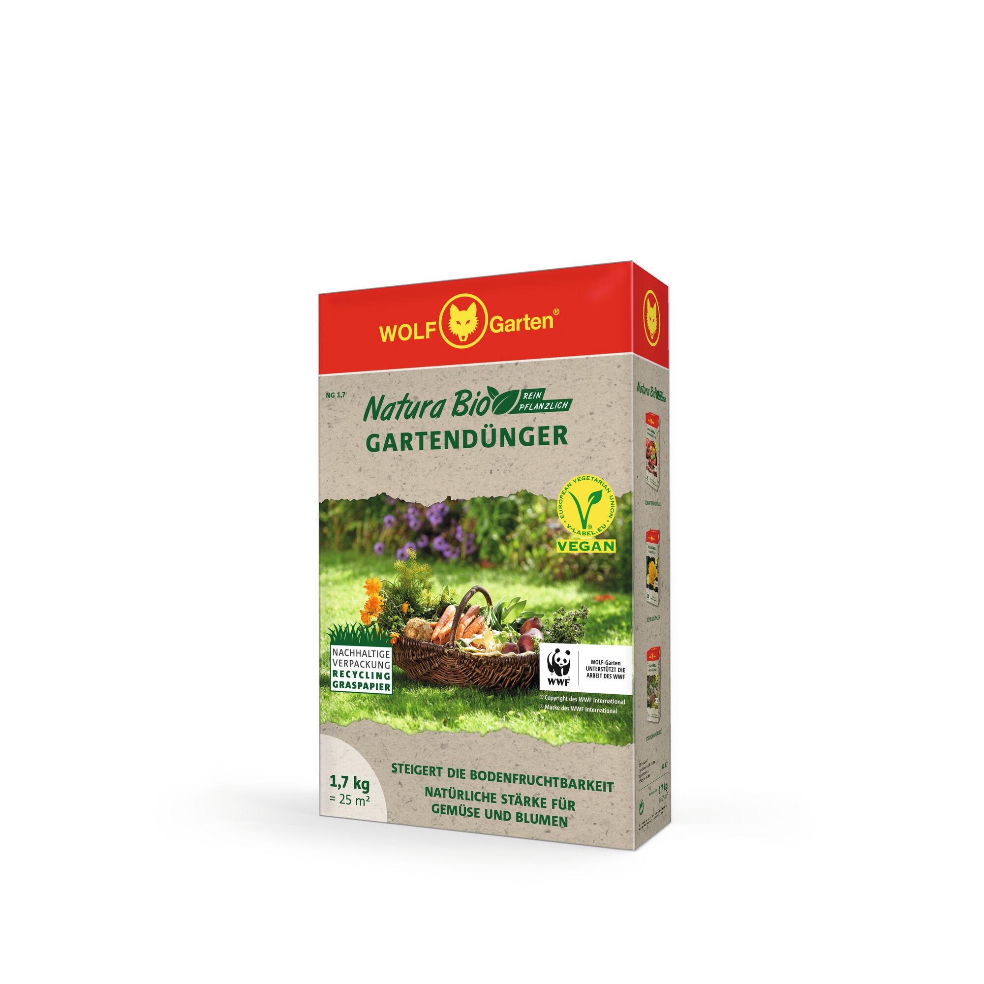 A box of WOLF-Garten Natura Bio garden fertilizer. The packaging is beige with red accents and features the WOLF-Garten logo at the top. The front shows a basket of vegetables and flowers on grass, with symbols indicating that it is vegan and uses sustainable and recyclable grass paper packaging. It mentions suitability for vegetables and flowers, and a weight of 1.7 kg for 25 square meters.