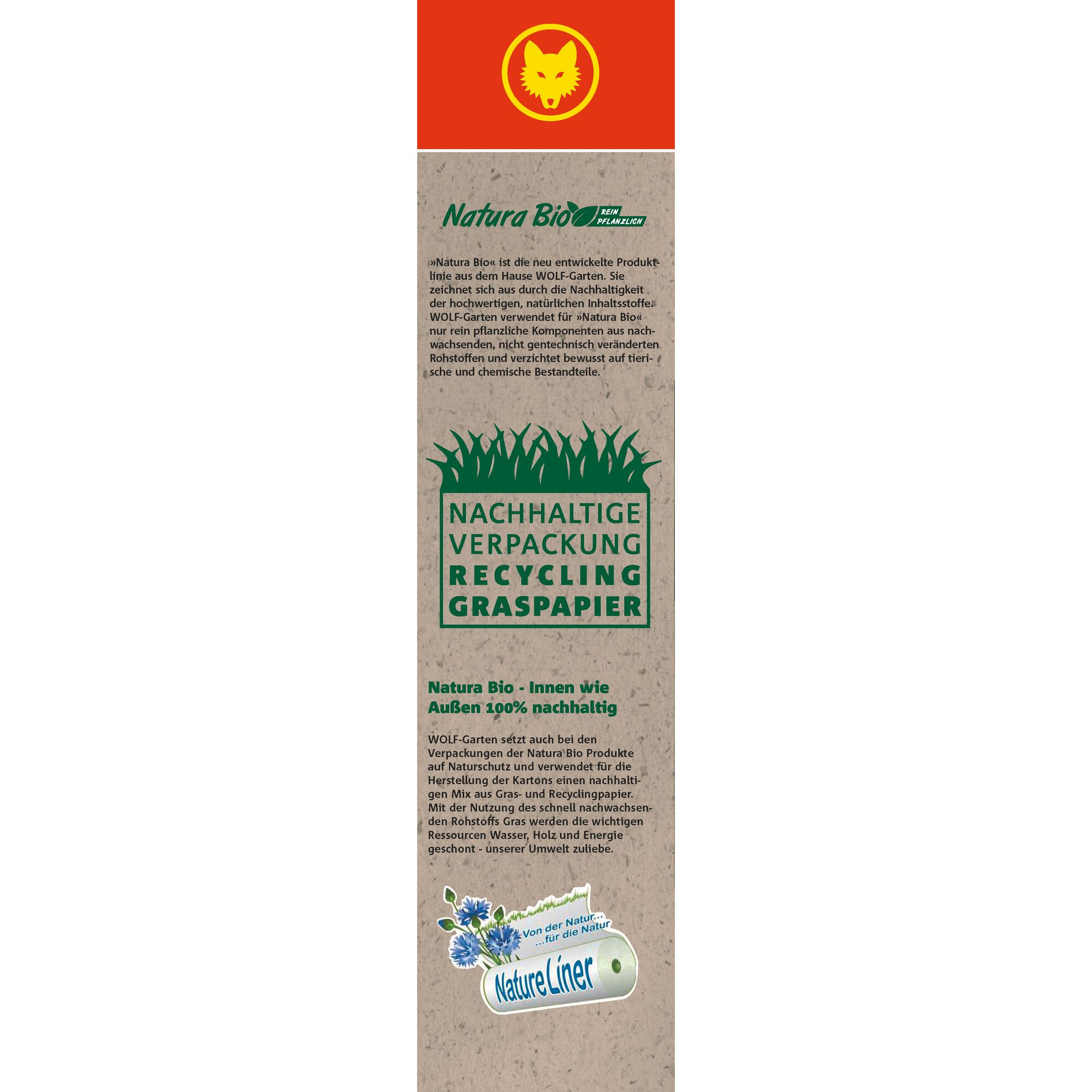 Vertical product packaging from WOLFGarten featuring Natura Bio. The design uses natural and recycled materials, highlighting sustainable packaging with grass paper and a 'NatureLiner' badge. German text emphasizes 100% sustainable inside and out, made from rapidly renewable raw materials, and free from animal-based and chemical components.