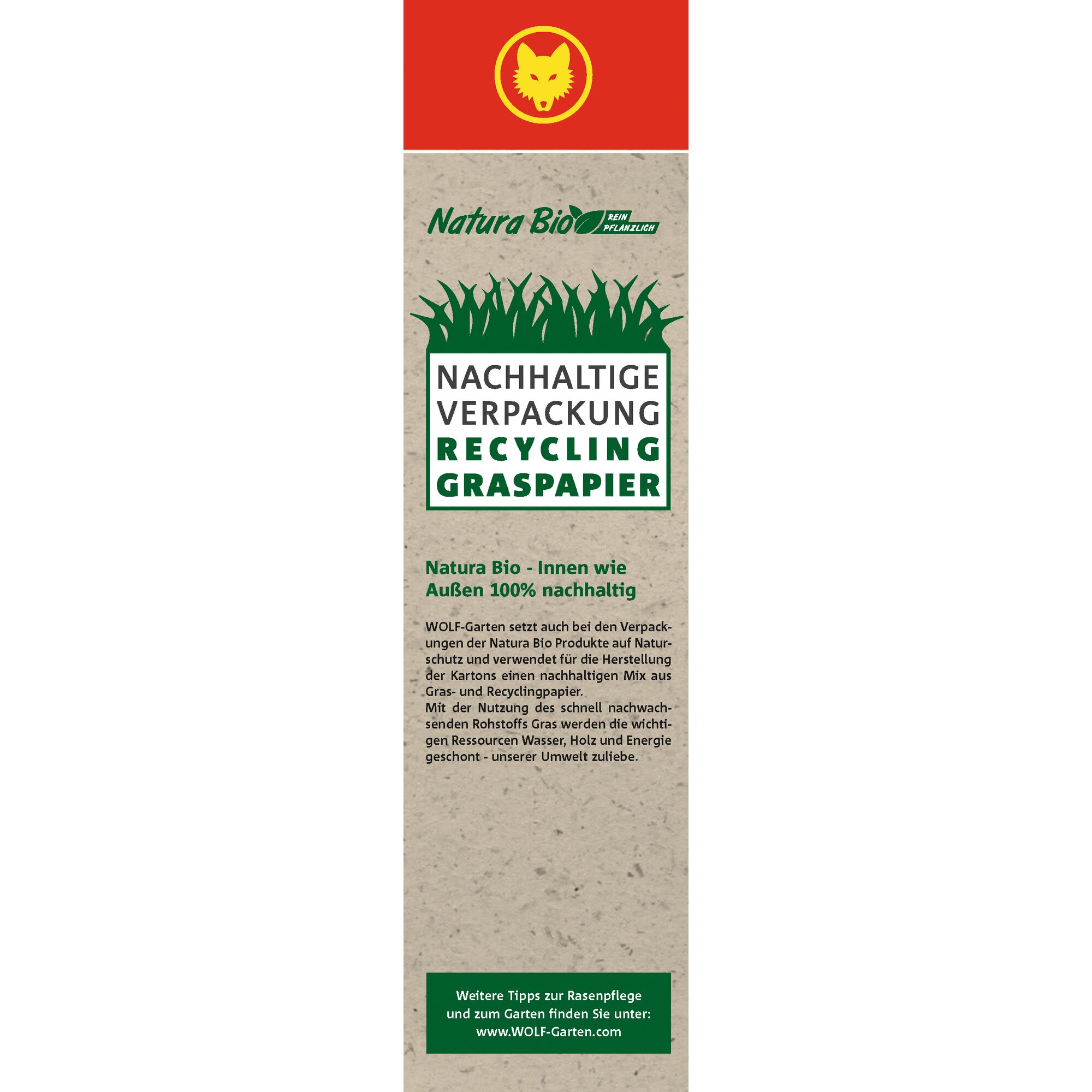 Promotional packaging of WOLFGarten Natura Bio featuring sustainable packaging made from recycled grass paper. The design shows a red section with a yellow wolf logo, green grass illustration, and text highlighting eco-friendly and recyclable materials. Additional information is provided in German about environmental benefits and the product’s sustainability.