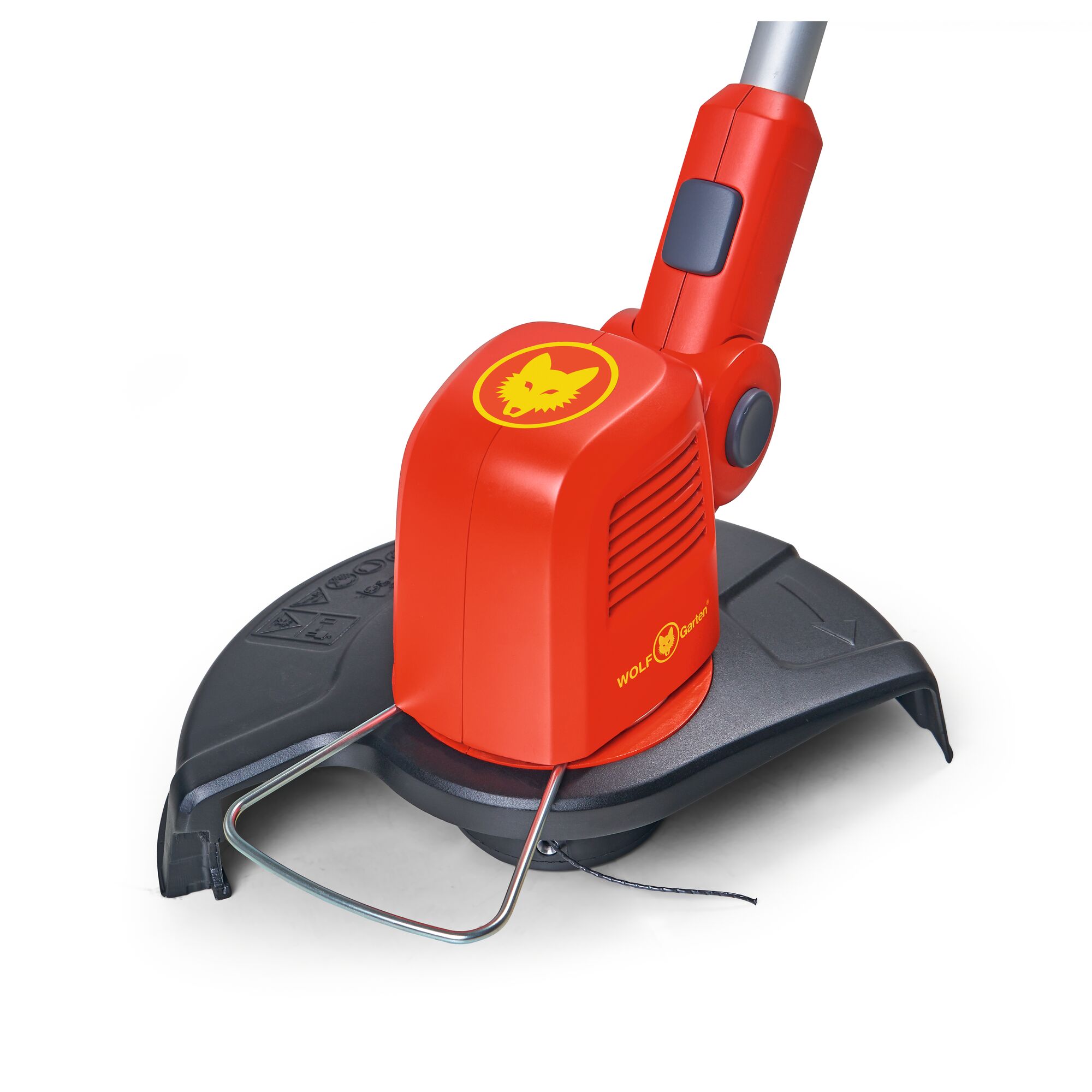 Close-up of the cutting head of a WOLF-Garten electric grass trimmer, showing its red and black design with the yellow WOLF-Garten logo, a protective guard, and cutting wire.