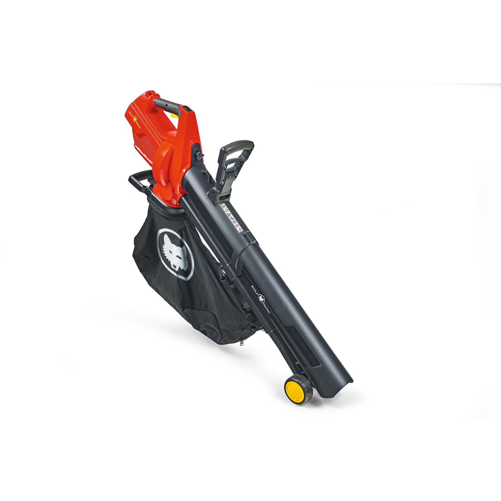 A red and black garden leaf blower and vacuum with a collection bag attached, featuring wheels and handles for easier use. The collection bag displays a wolf head emblem.