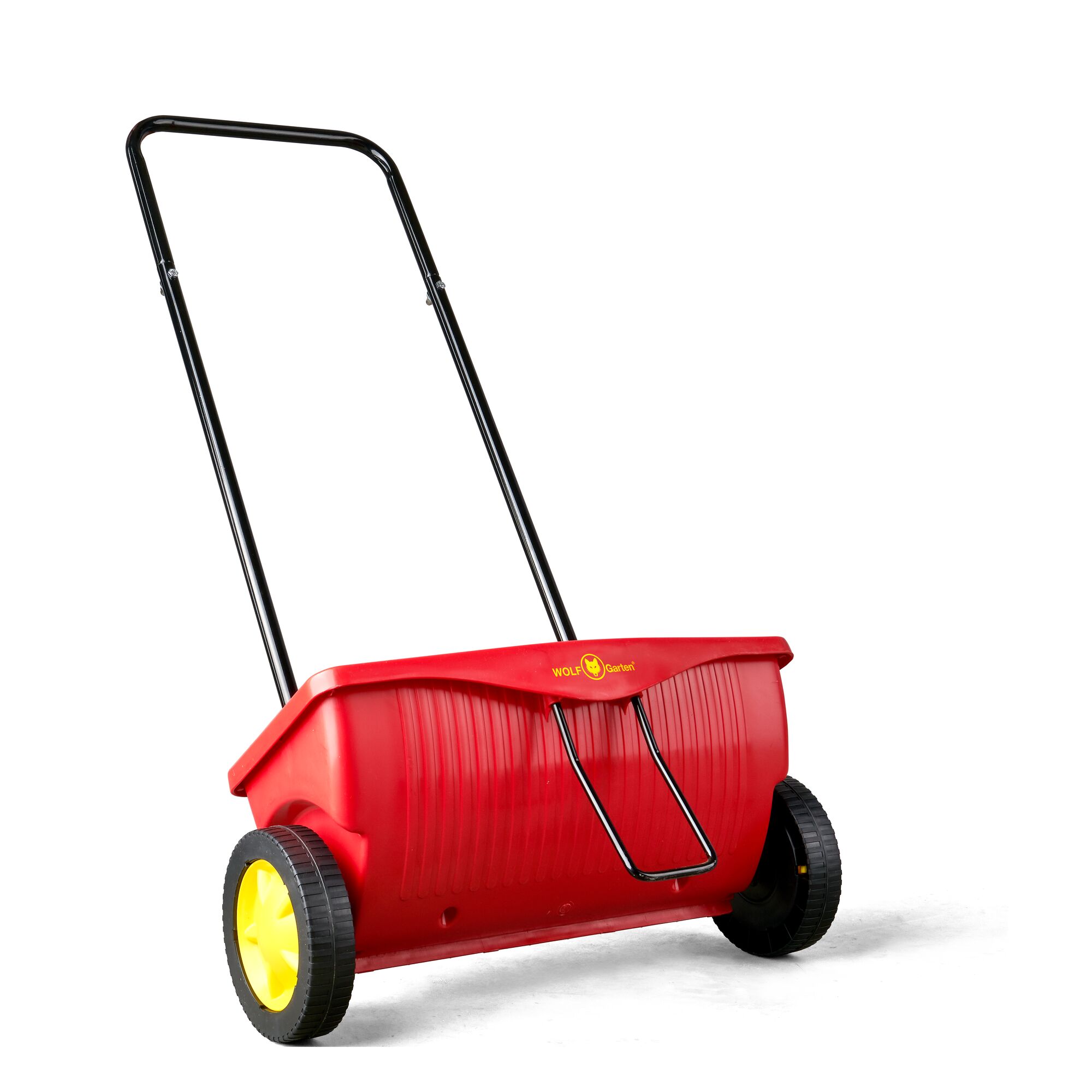A red and yellow wheeled lawn spreader with a black metal handle, branded with WOLF-Garten, designed for distributing seed or fertilizer on lawns.