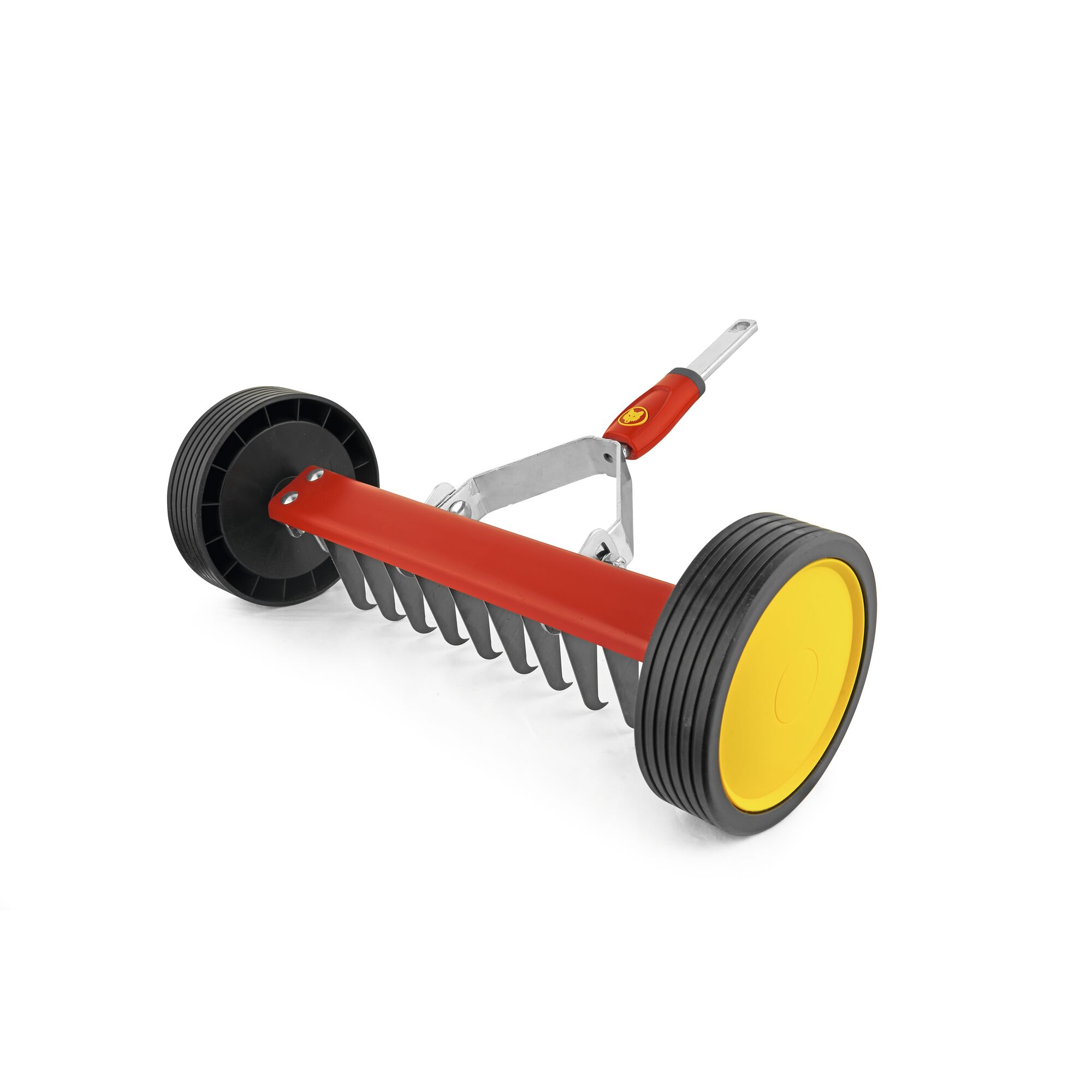 A manual lawn scarifier with two large wheels and a red metal body, designed for removing moss and thatch from lawns. The handle attachment is visible.