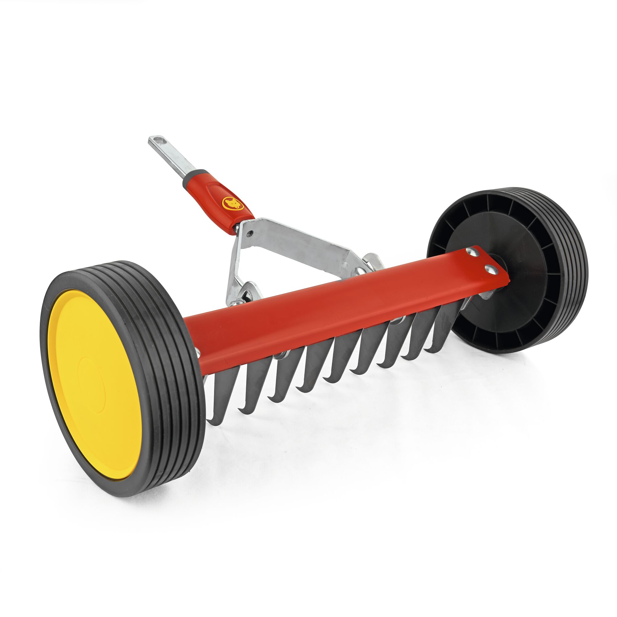 A garden tool with two large black and yellow wheels and a red metal frame equipped with multiple black tines, designed for lawn care and maintenance.