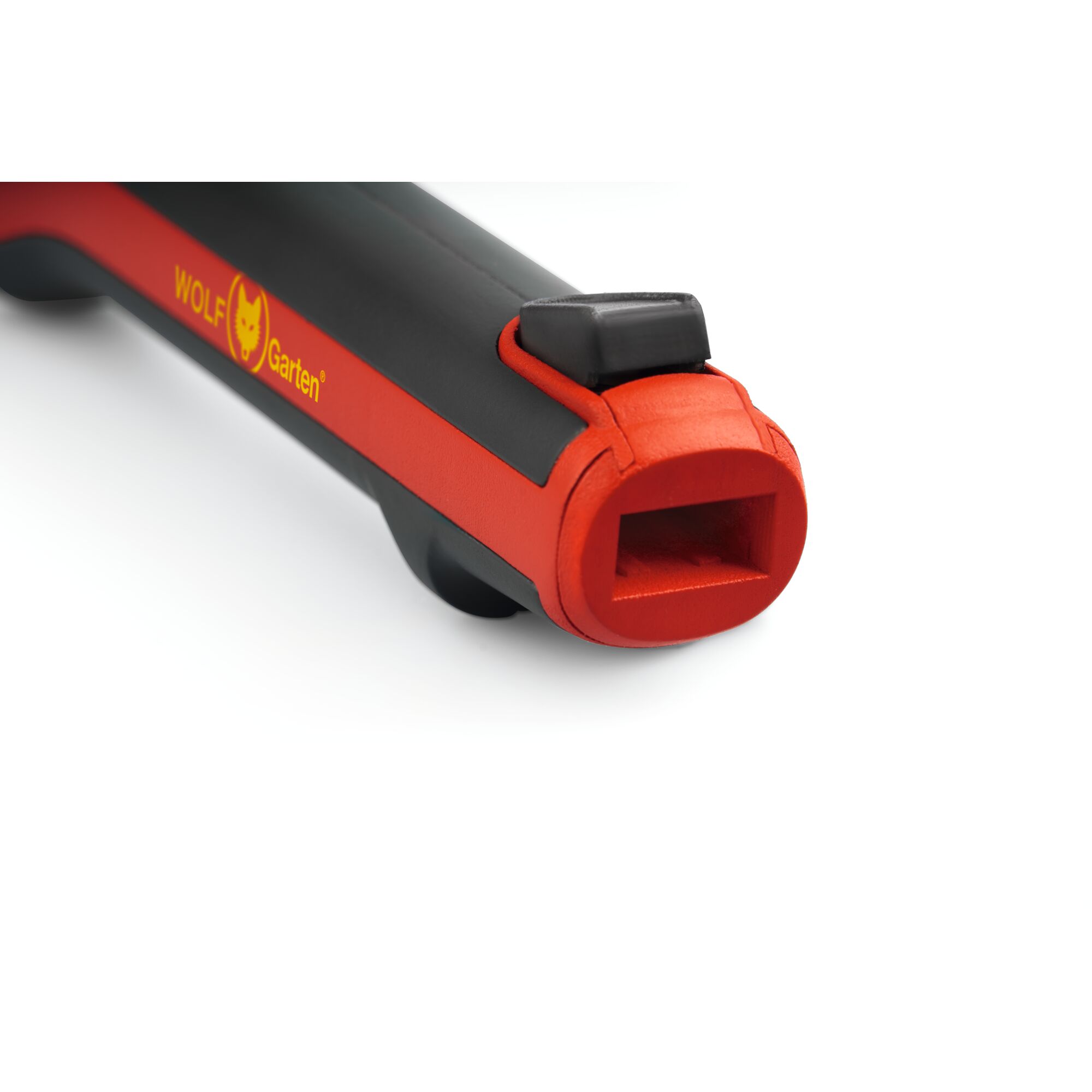 Close-up view of the handle of a WOLF Garten tool, showing a black and red ergonomic design with a rectangular opening at the end.