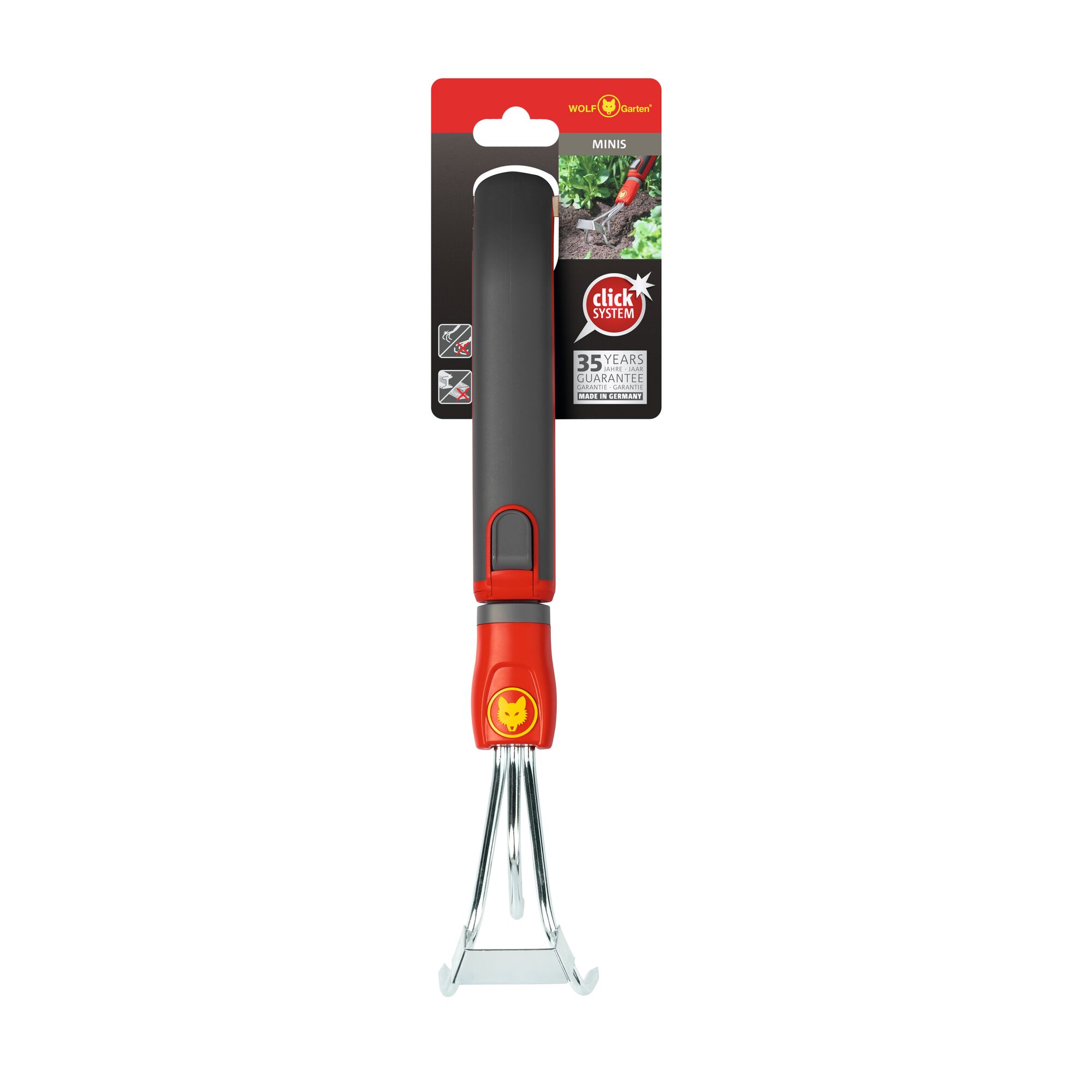 A WOLFGarten gardening hand tool with a black and red handle and metal prongs, shown in its packaging. The packaging displays the WOLFGarten logo and indicates it is part of the Minis series and the Click System.