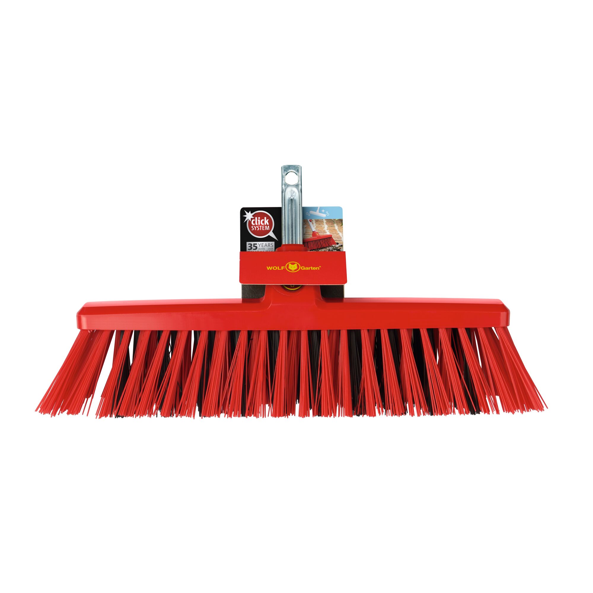 A WOLFGarten red outdoor broom head with thick bristles and a metal attachment for a handle, displayed on a white background.