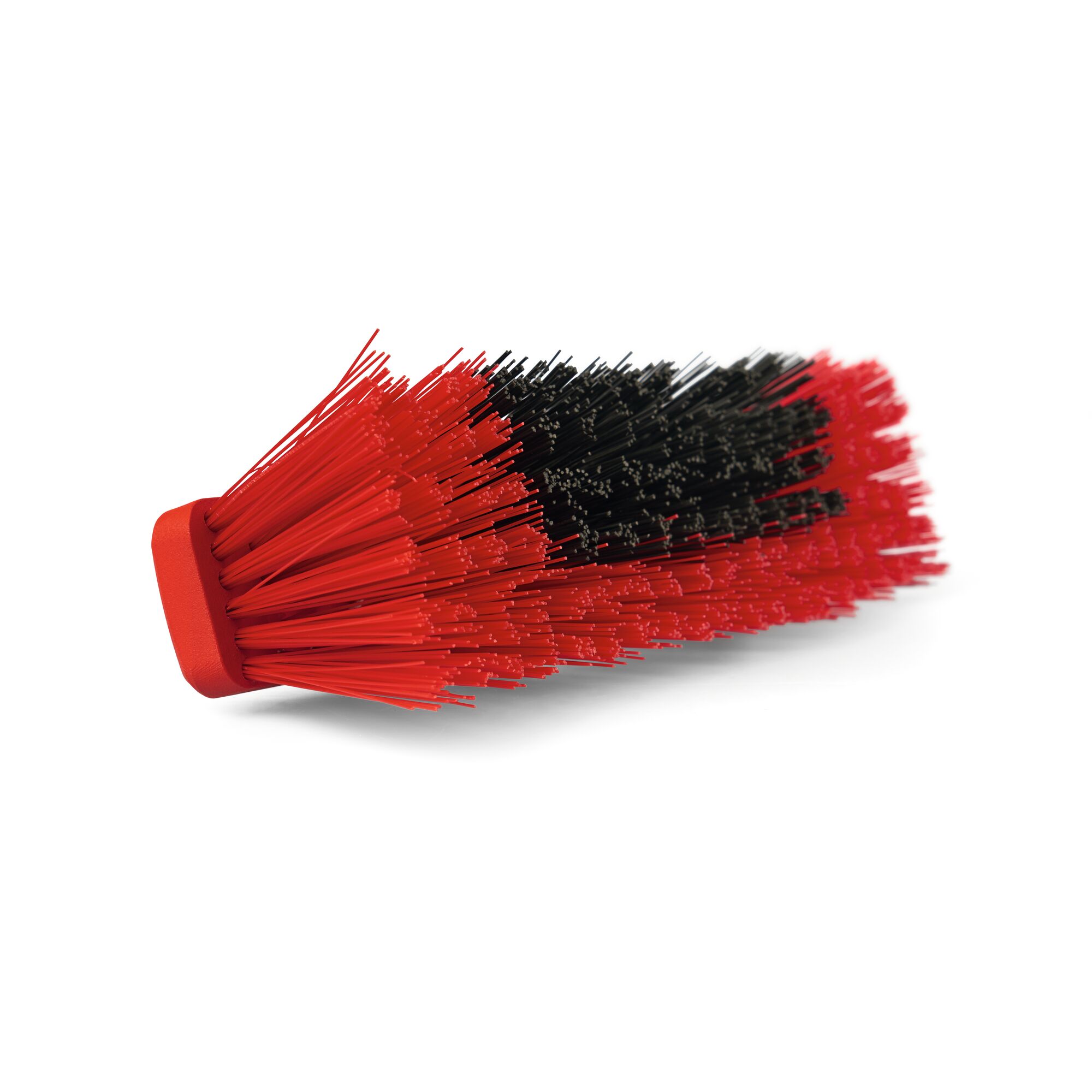A close-up image of a red and black angled cleaning brush with synthetic bristles, designed for outdoor use.