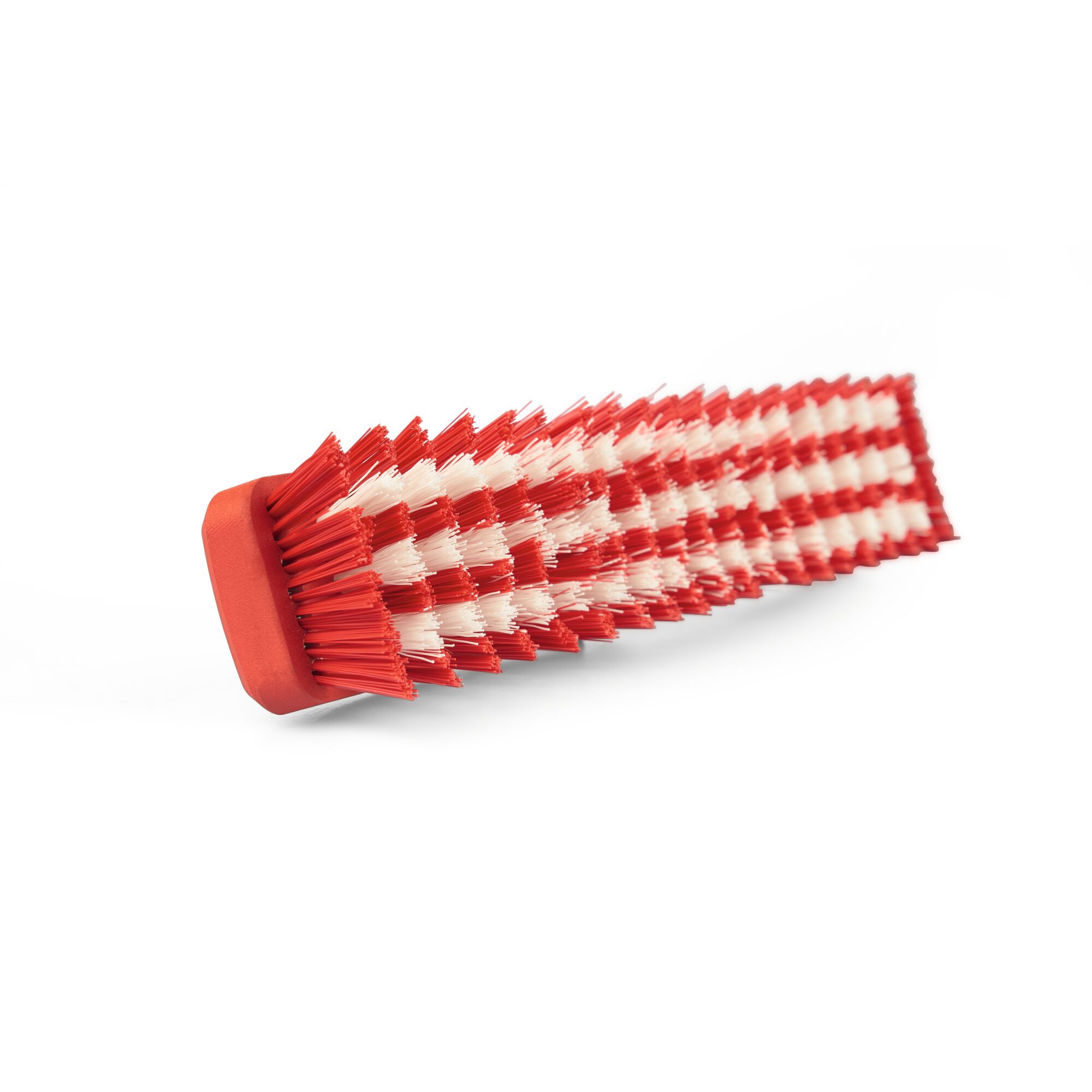 A close-up image of a red and white angled brush head with stiff bristles, designed for cleaning surfaces.