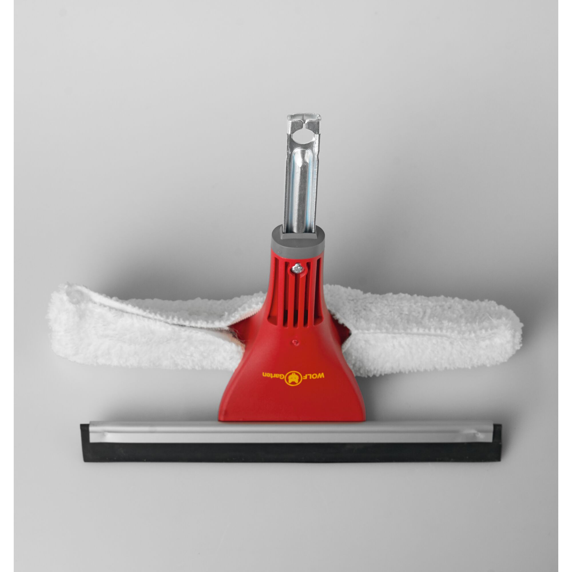 A WOLF-Garten window cleaning tool with a red handle, featuring a detachable microfiber pad and a rubber squeegee blade, designed for efficient cleaning of glass surfaces.