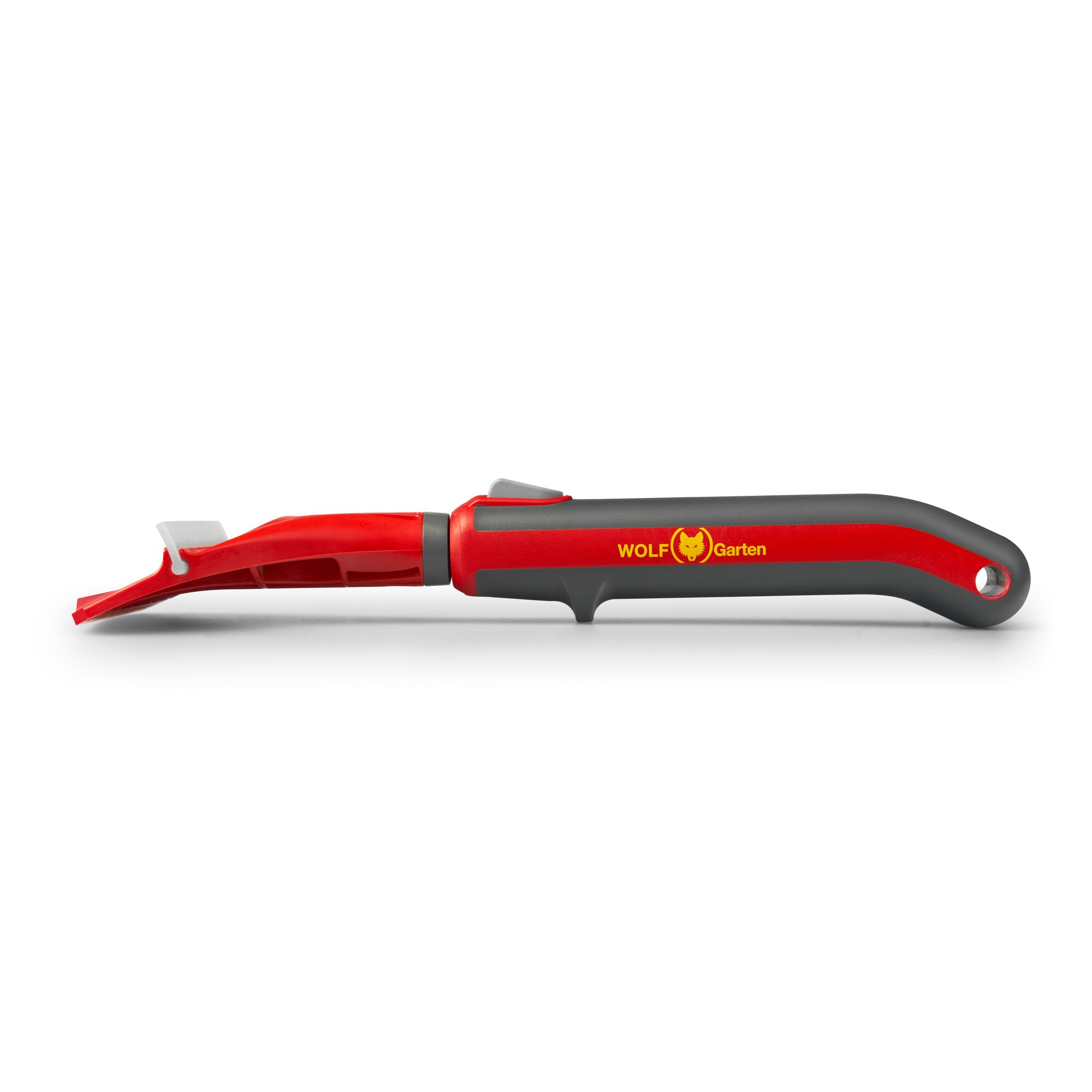 A red and black WOLF Garten hand tool, likely for gardening, with an ergonomic handle and angled metal blade.