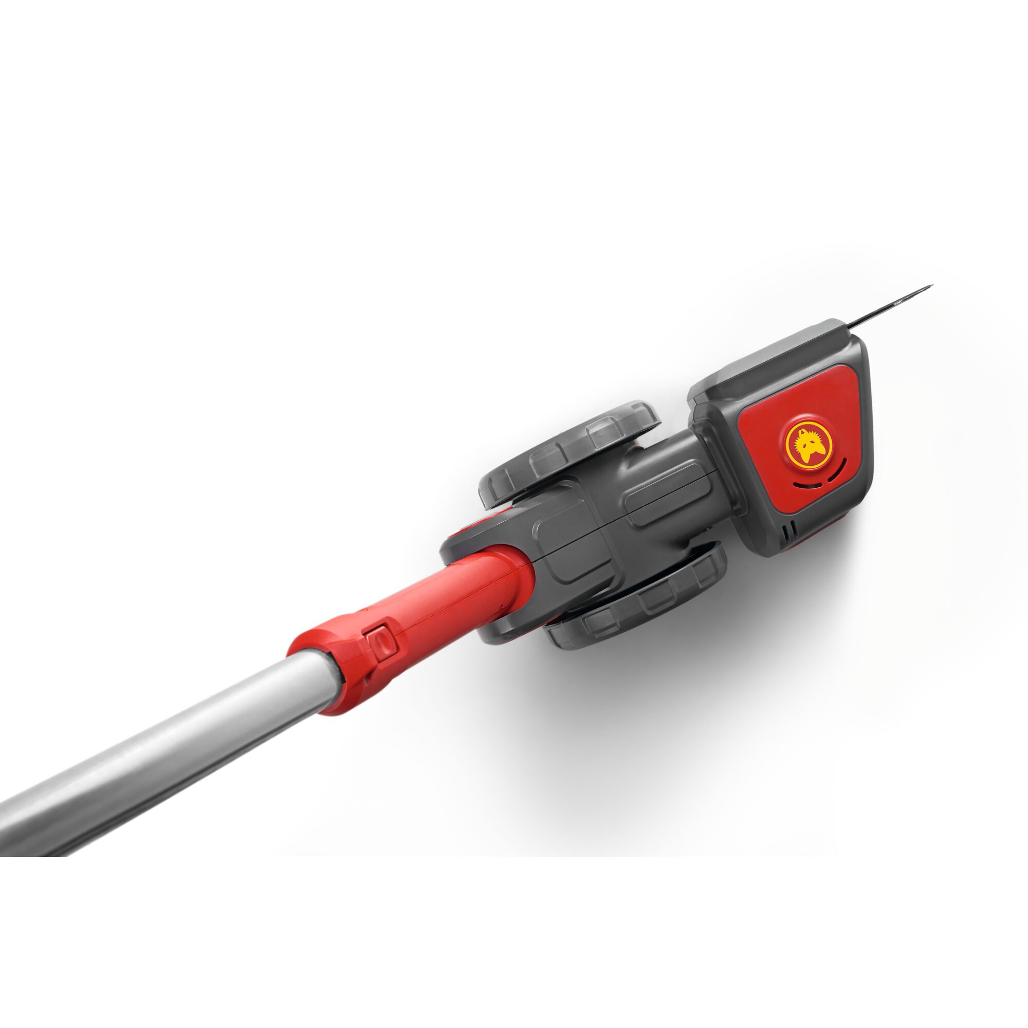 Close-up of a WOLFGarten garden tool, featuring a gray and red handle with two gray wheels and a red section displaying the brand logo.