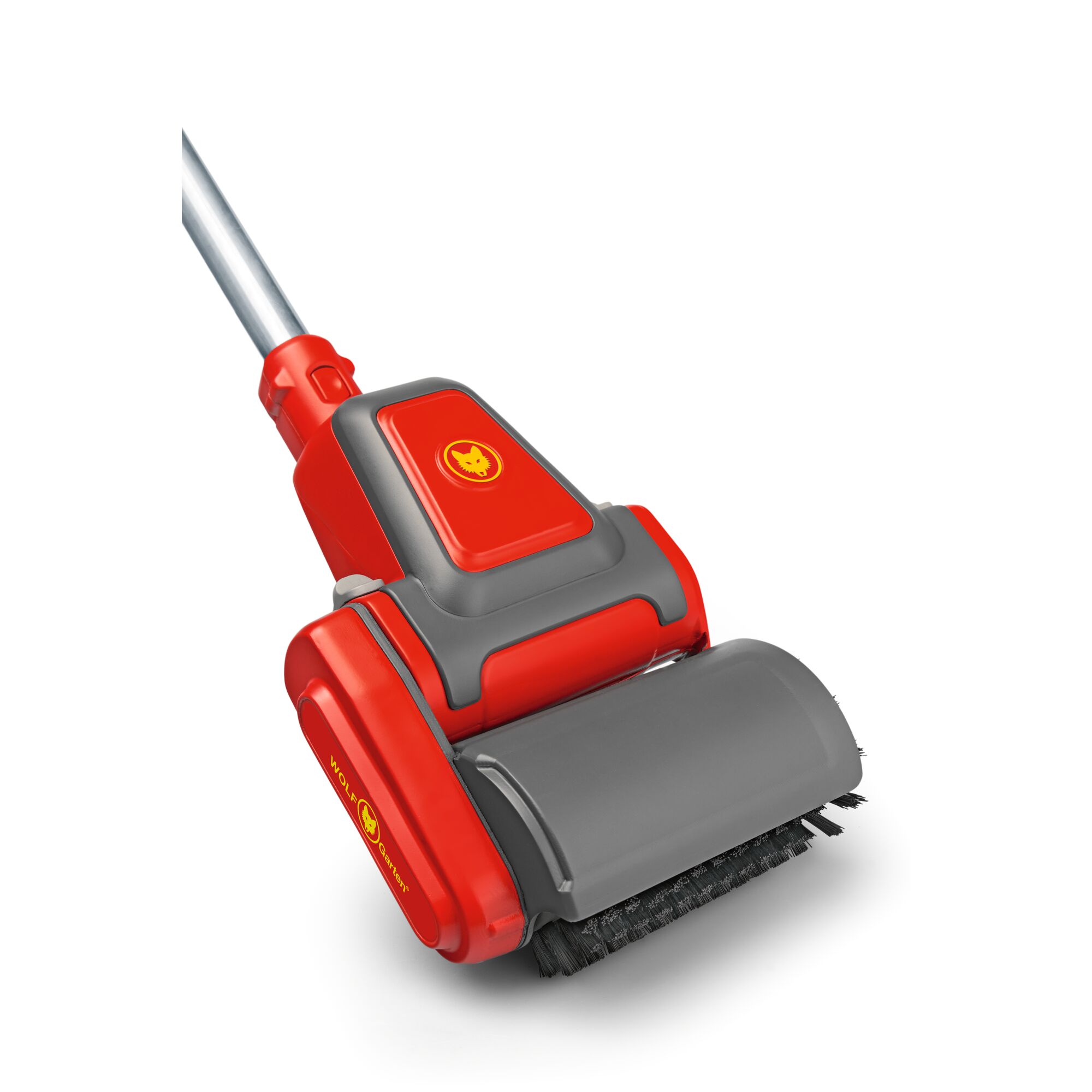 A close-up of a red and grey WOLF-Garten garden tool with a brush attachment, photographed against a white background.