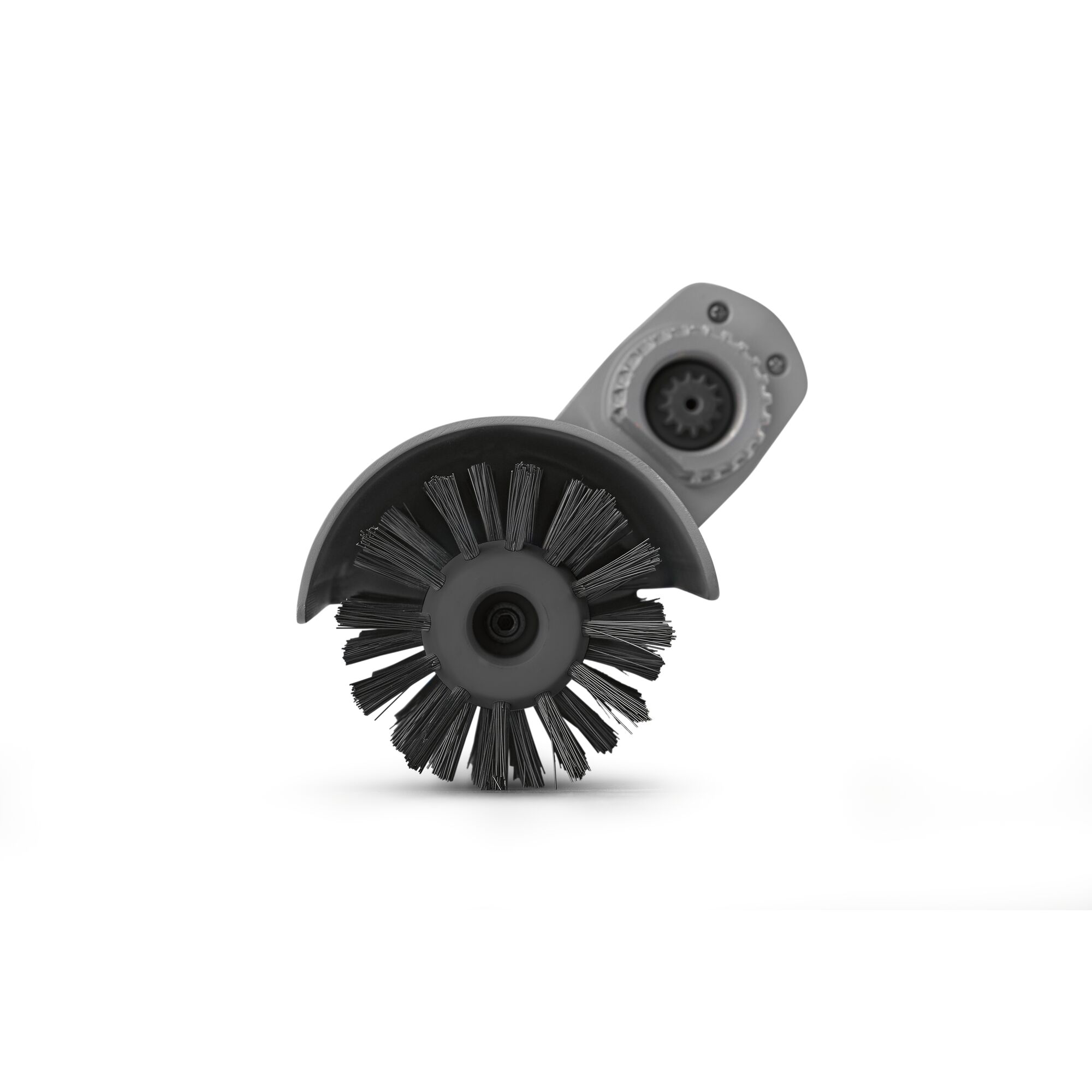 A close-up image of a round, black brush attachment with stiff bristles and a protective cover, photographed against a plain white background.