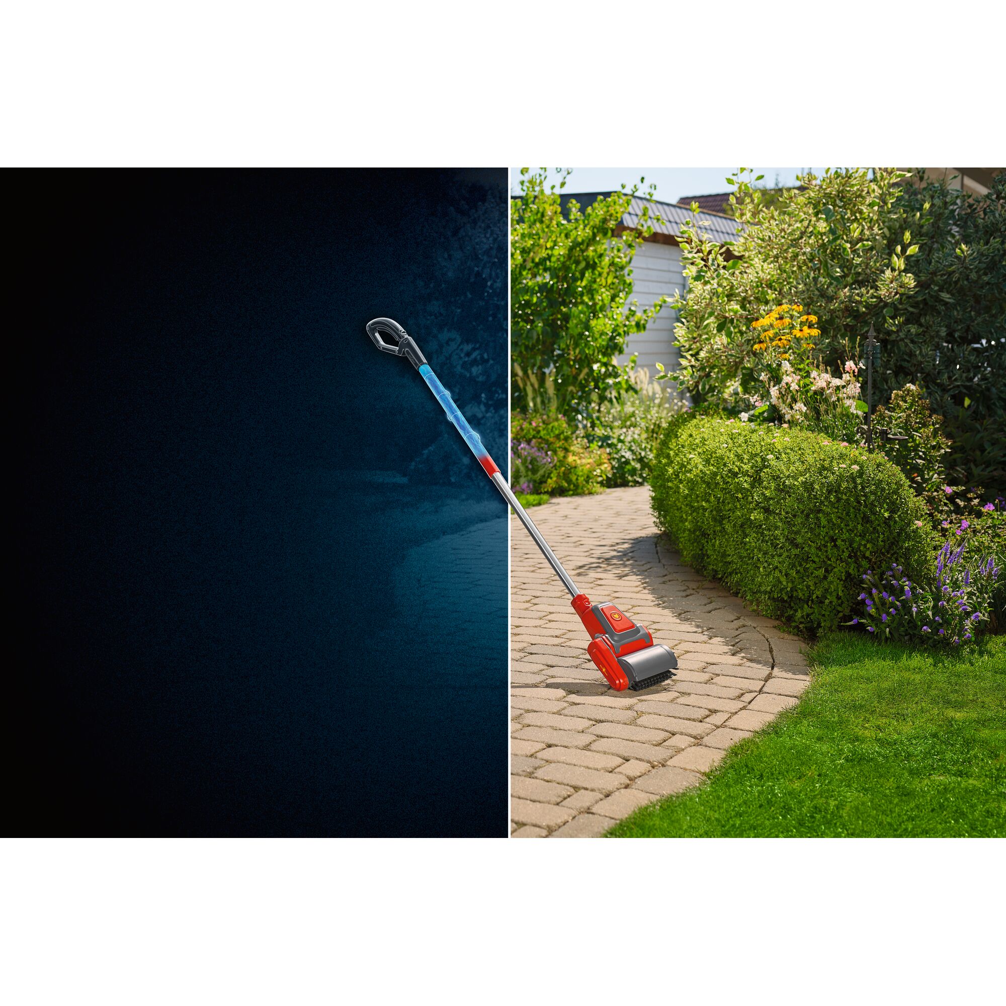 A red and silver WOLF-Garten electric garden tool being used to clean between paving stones along a garden path with hedges and flowers.
