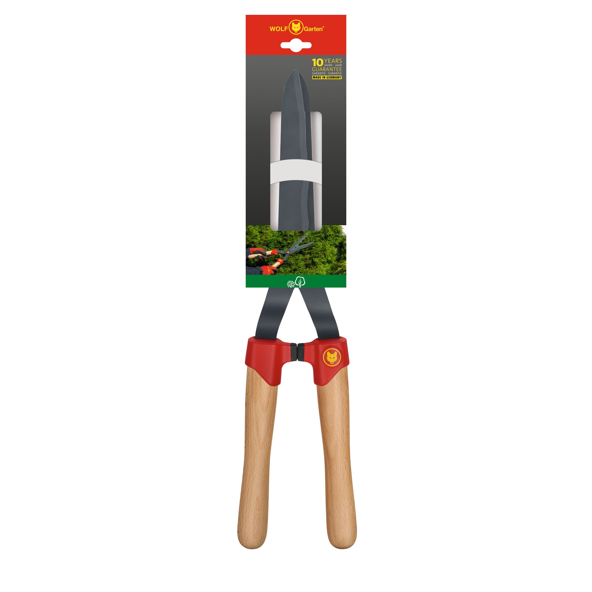WOLFGarten hedge shears with wooden handles and red accents, shown in original packaging with a label highlighting a 10-year guarantee.