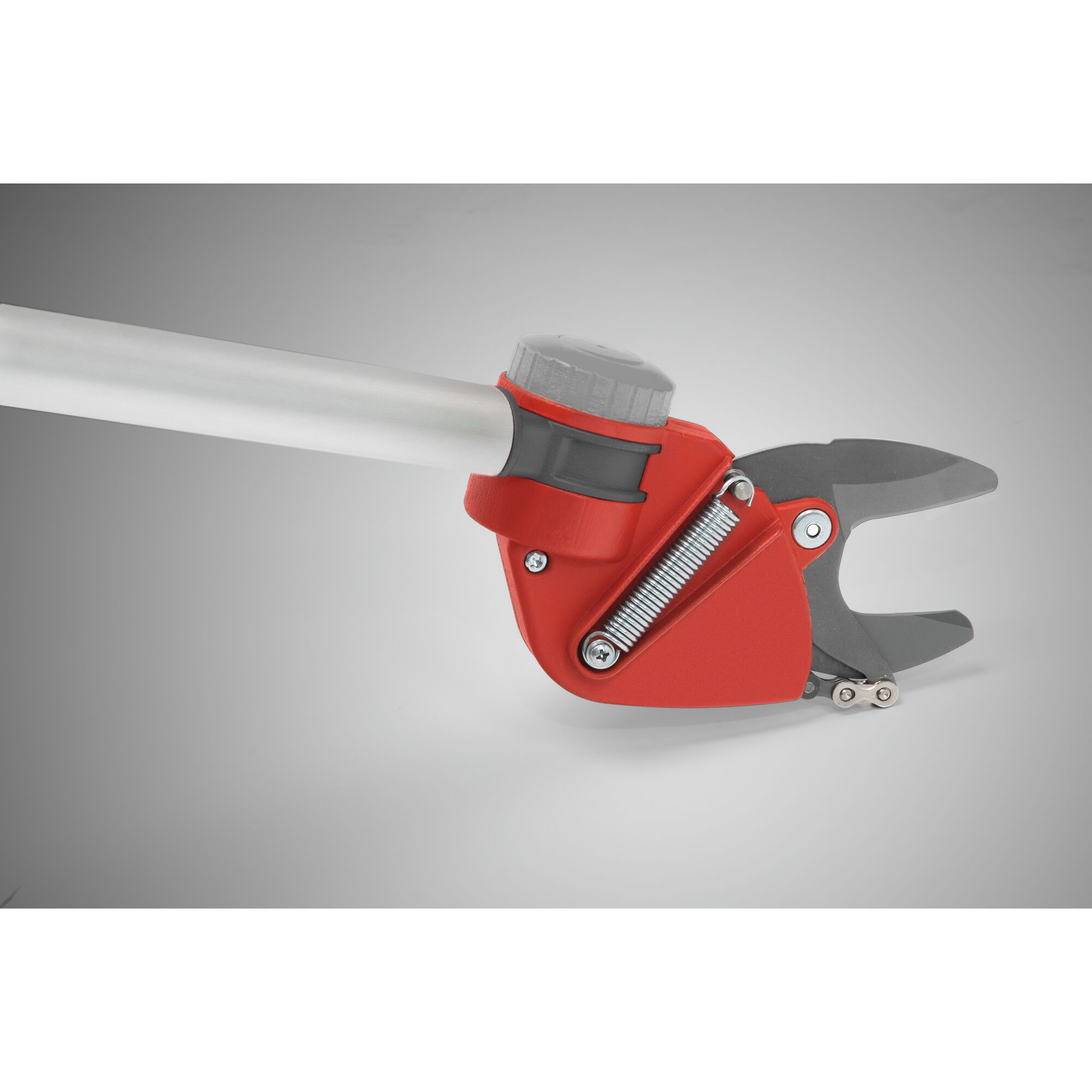 Close-up view of a WOLFGarten pruning tool featuring a red and grey cutting head attached to a silver handle, designed for precise garden trimming.