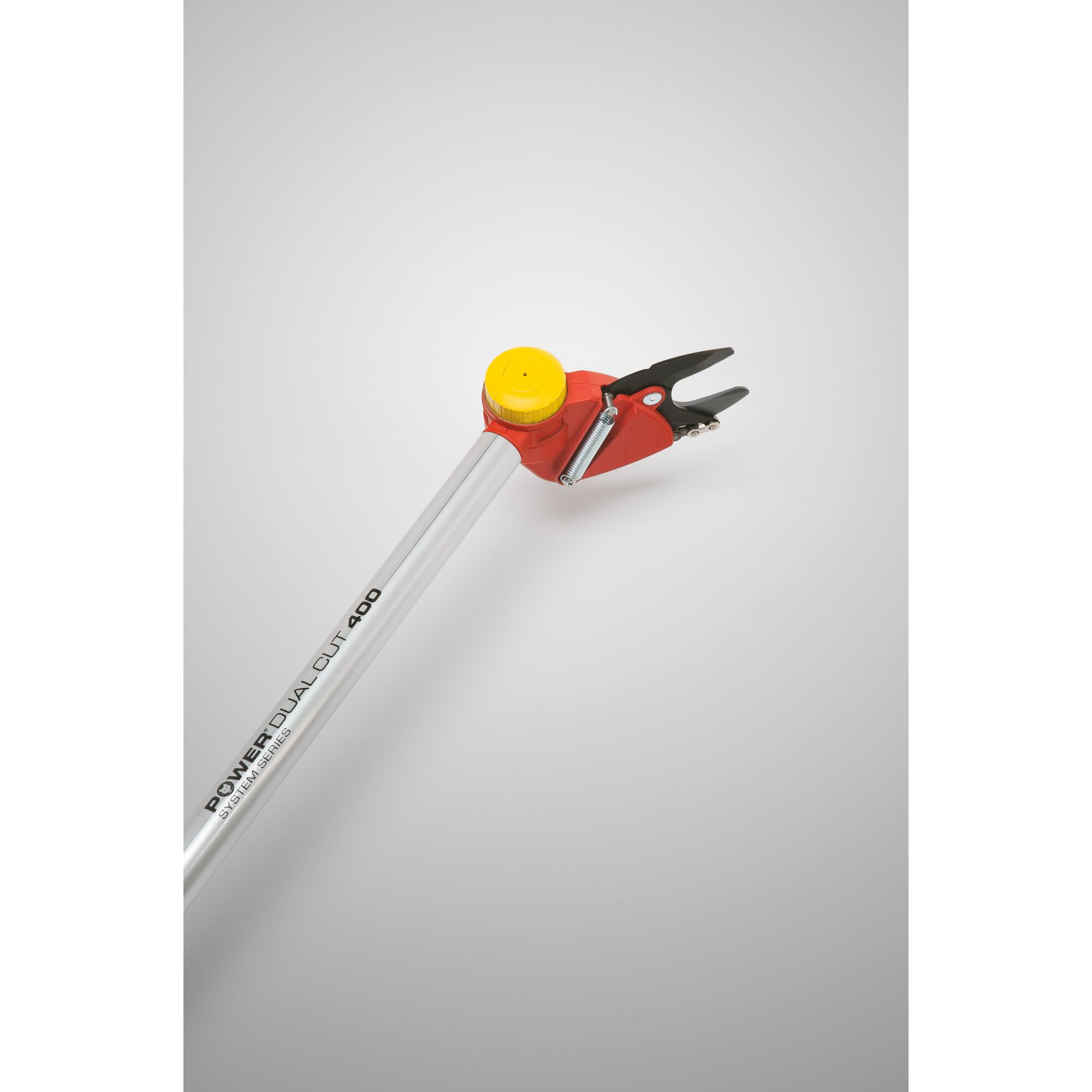 A close-up image of a WOLFGarten POWER DUAL CUT 400 garden pruner with a silver handle, red and yellow cutting head, and black blades, designed for trimming branches.